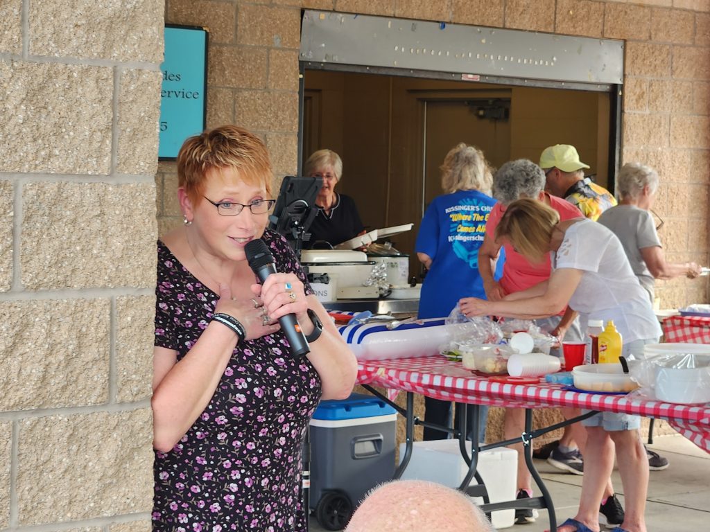 Yvonne performing at a picnic